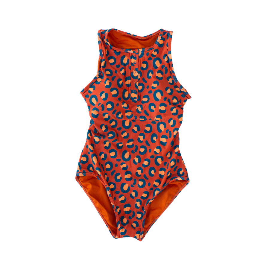 Orange swimsuit with blue leopard print on a white background